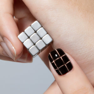 Rubik's cube formation with 27-piece magnet set - creates checkerboard cat eye pattern effect
