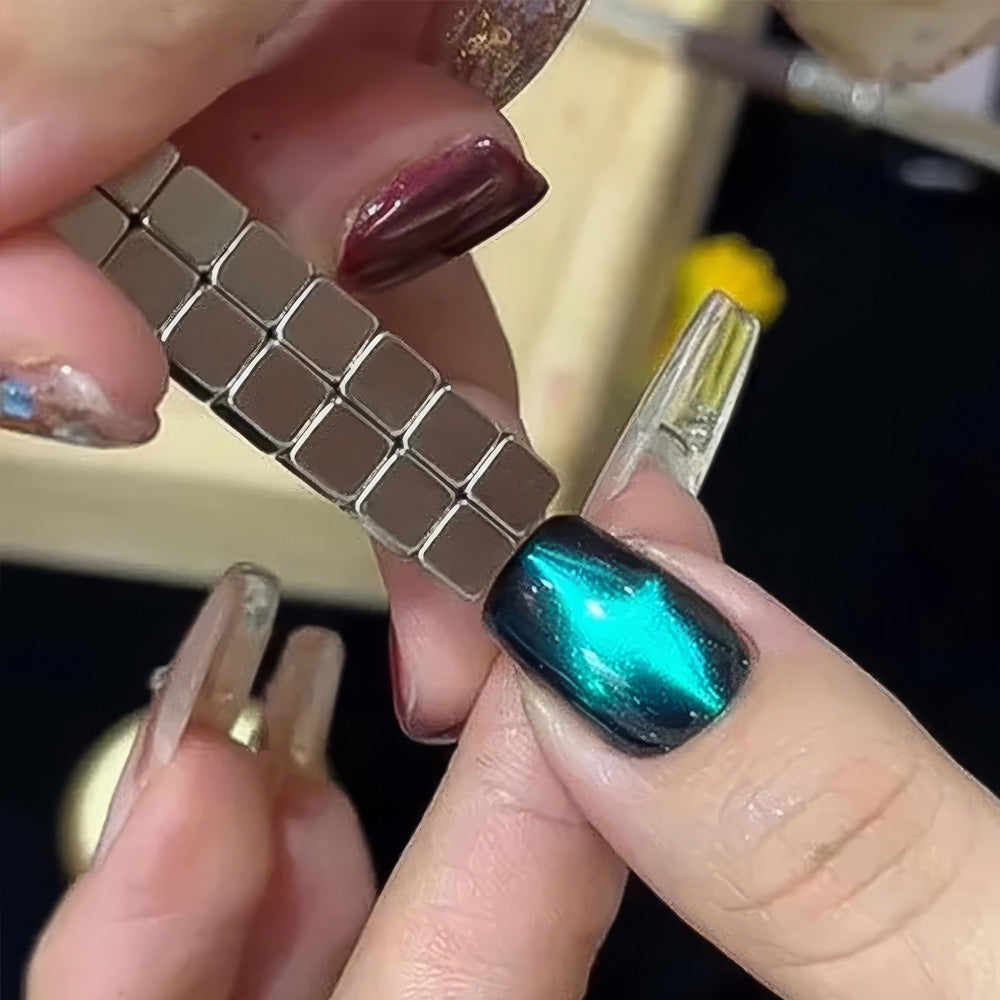27-piece cube magnet in use - strong magnetic force creates instant cat eye effect on nail
