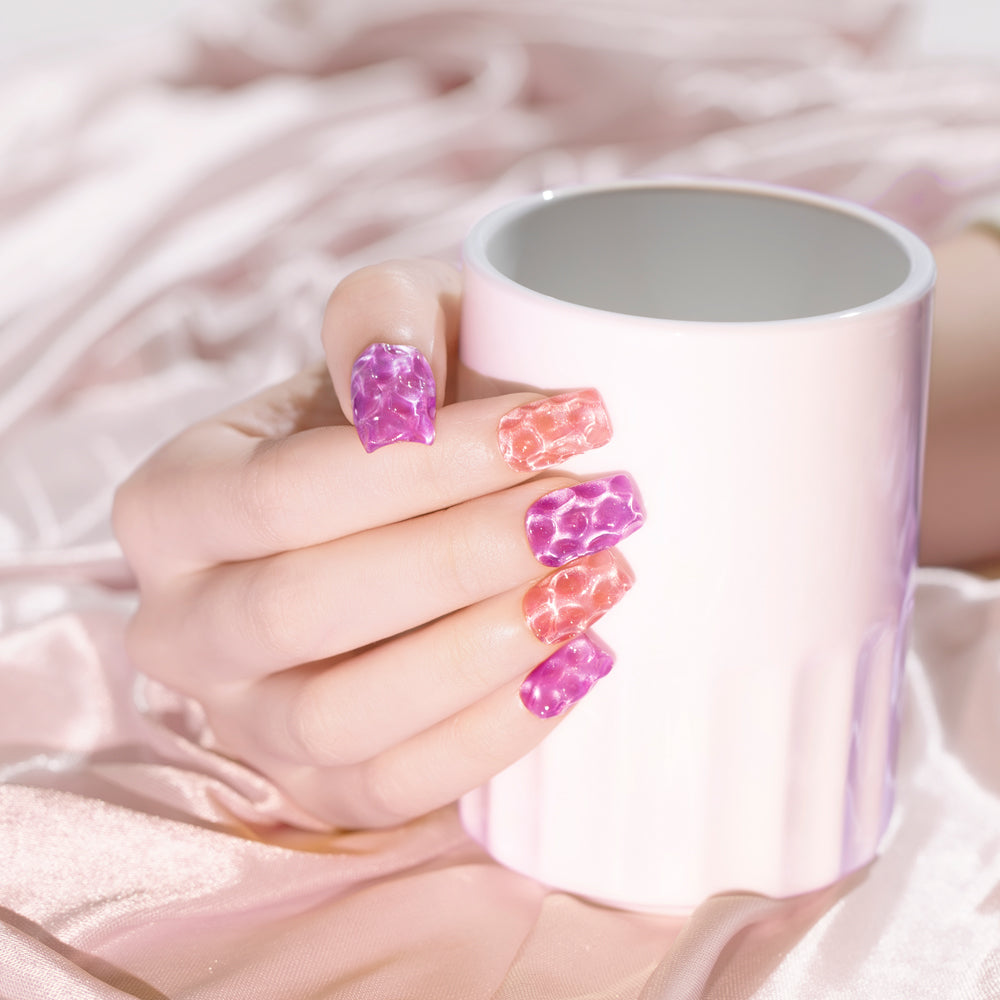 Blooming gel nail art watercolor marble effects purple pink rosy lavender moonlight creative patterns romantic design
