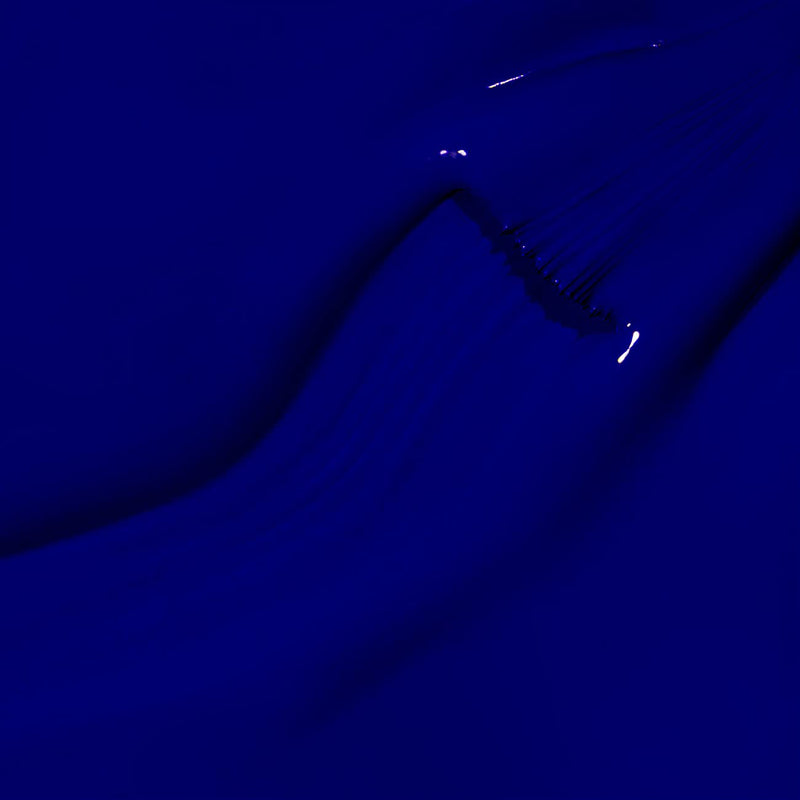 Navy blue gel texture smooth self-leveling creamy formula ultra-pigmented deep sapphire close-up
