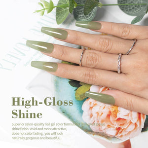 Sage green jelly manicure high-gloss shine long coffin nails natural elegant look with silver rings
